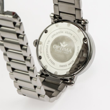 Optima - Swiss Watch - OSL313-SS-3
 Quartz
 35 x 38 mm OSL313 30 meters (3 ATM / 100 feet)