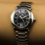 Optima - Swiss Watch - OSL313-SS-3
 Quartz
 35 x 38 mm OSL313 30 meters (3 ATM / 100 feet)